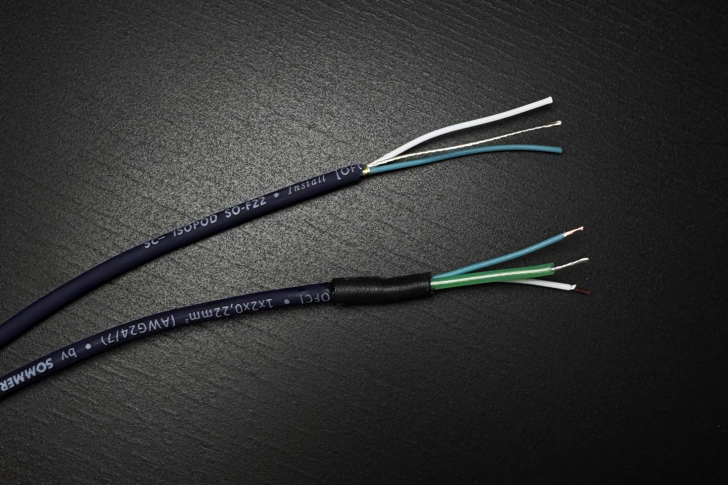 A stripped audio cable, before & after being prepped.
